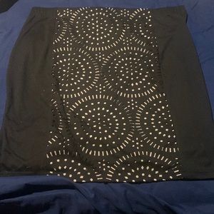 2x black pencil skirt with laser cut outs